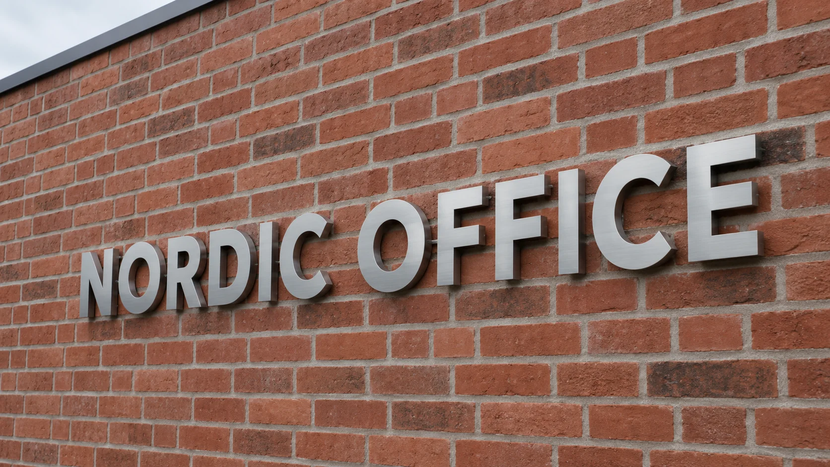 Hvordan sidder facadebogstaver fast på muren?